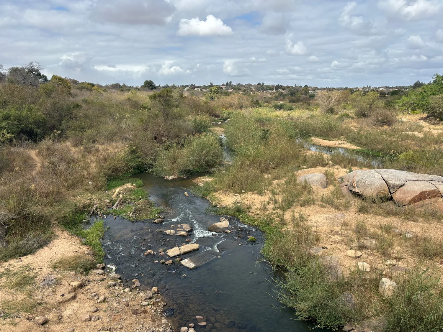 The Sand River at ground level — the partner the project asks its funders to stand with.