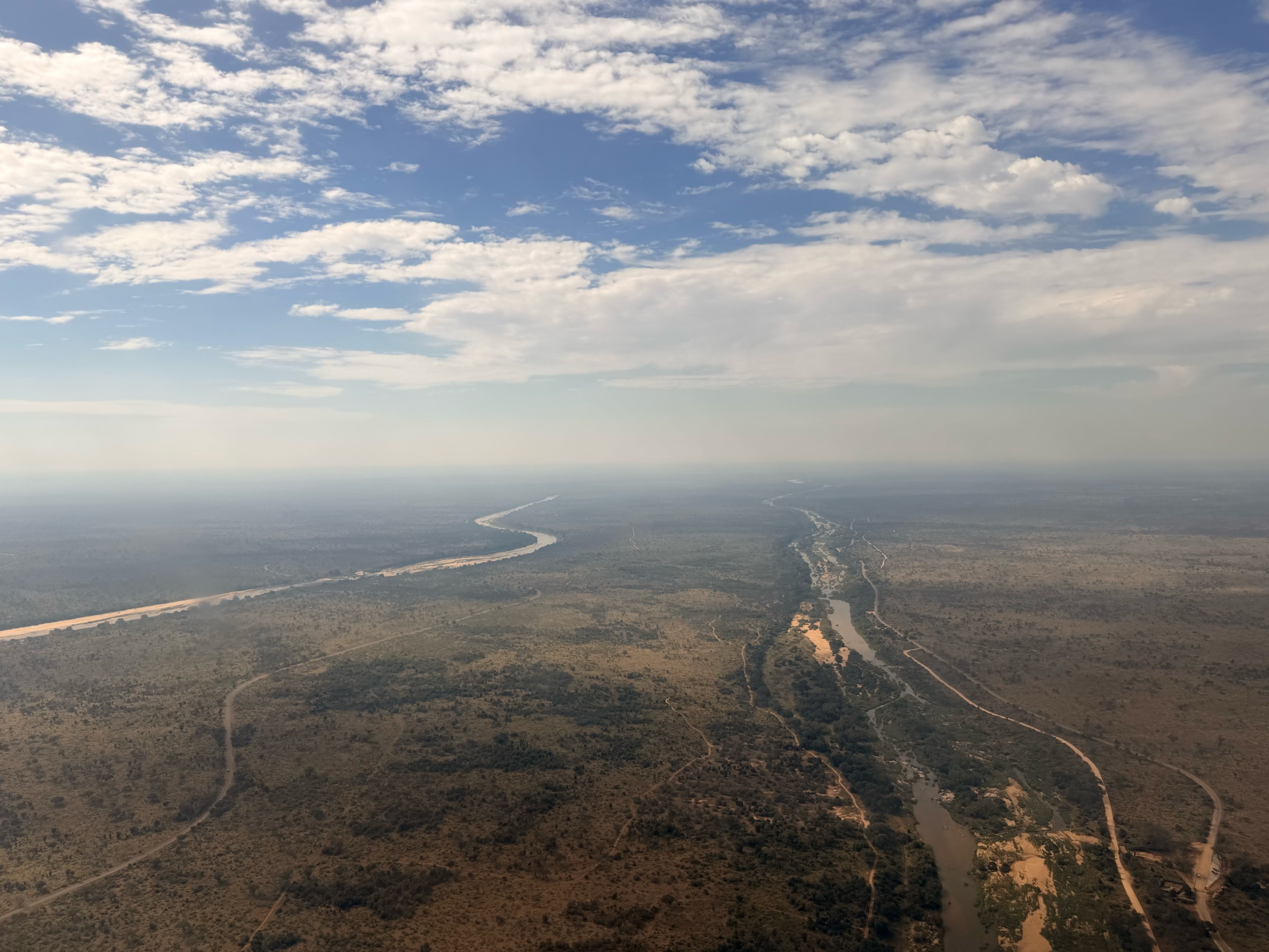 The Sabie and Sand Rivers meeting at their confluence — the catchment the project asks its funders to stand with.