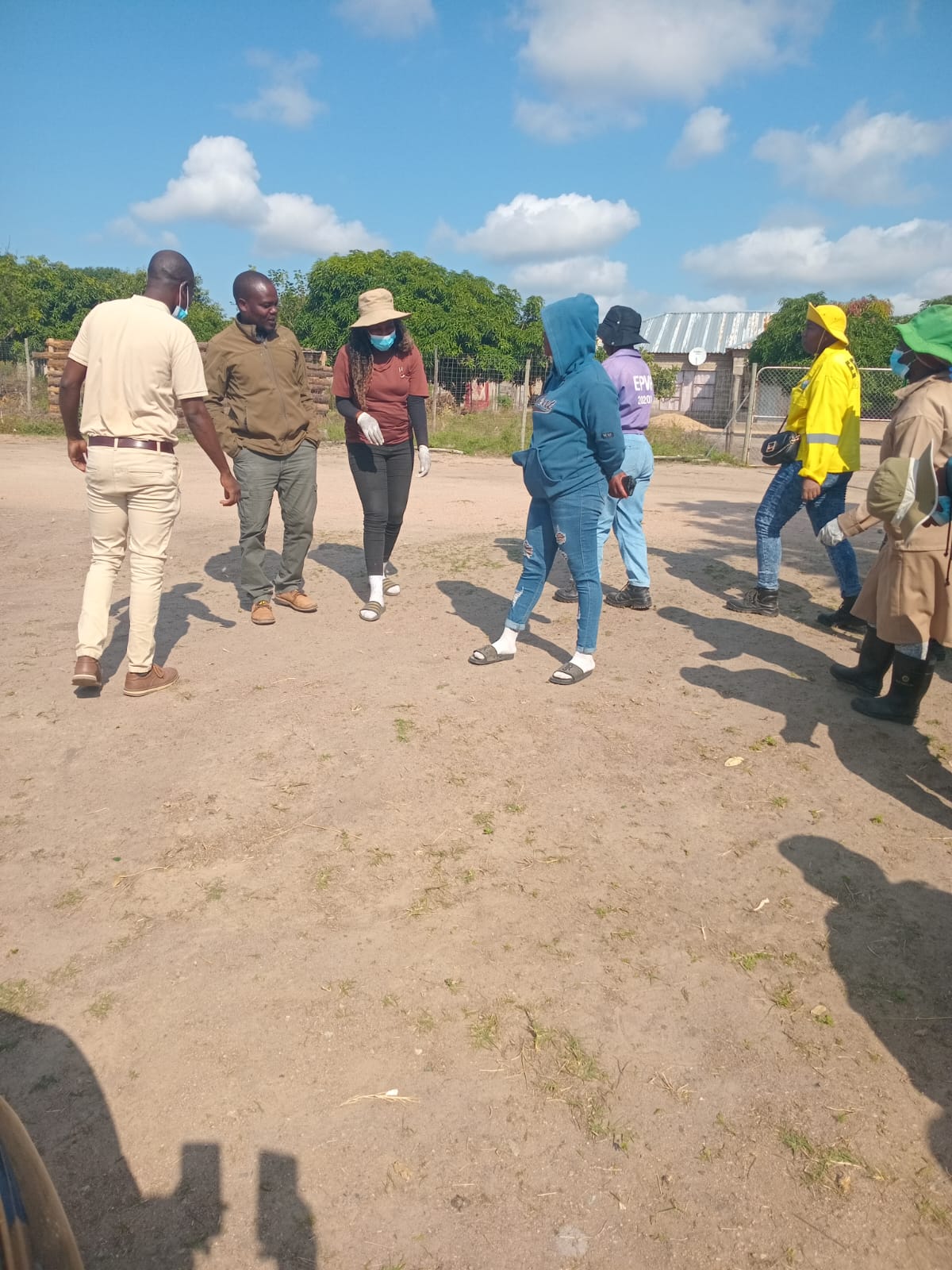Village volunteers gathering before the day's collection.
