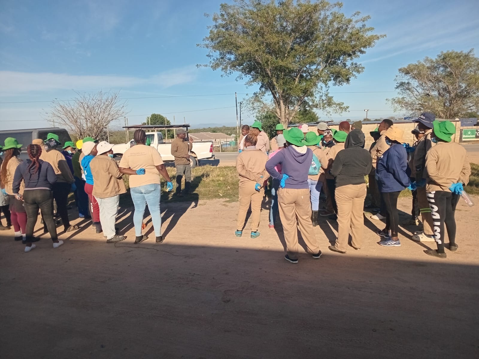 Volunteers gathering before the morning's work on the Sand.